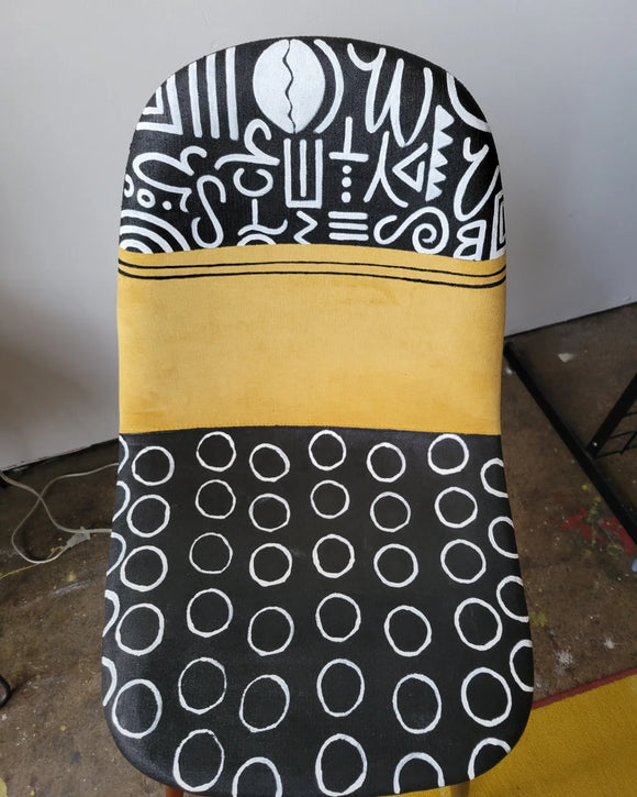 Yellow, black, and white chair!
